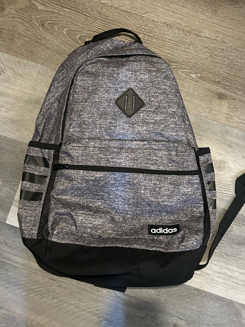 Adidas gray and black backpack